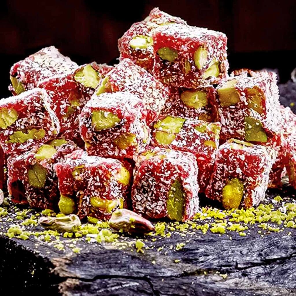 a pile of red and white food